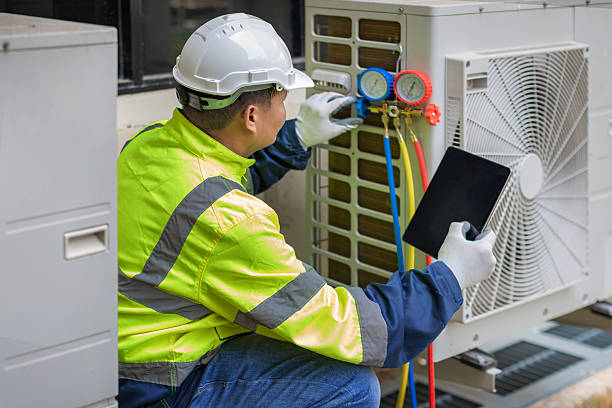 Professional Air Duct Cleaning technician working in Swartz Creek, MI